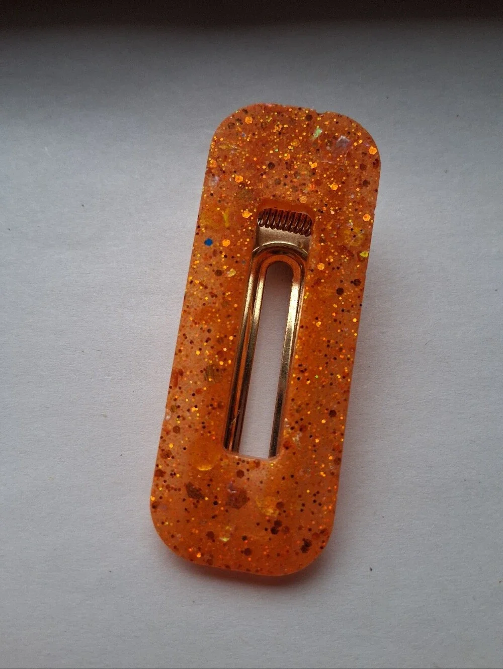 5/$25 Hand Crafted Orange Glitter Resin Hair Clip